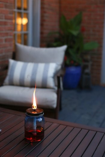 Here are 15 different types of backyard Tiki torches to inspire your outside entertaining this summer! These ideas include Tiki torches you can DIY. Don't miss it!