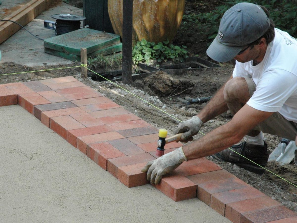 large-pavers-used-to-create-patio-in-backyard-quick-and-easy