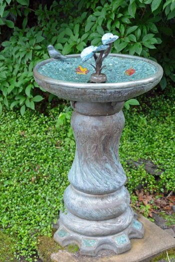There is something about a bird bath that really completes a garden. They are so cute and attract beautiful birds to your yard. For more garden art ideas, look here. 