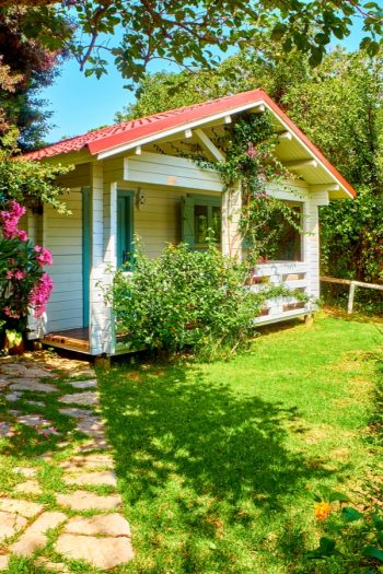 There's no denying the charm of a cottage flower garden. Did you know you can extend that charm all the way through to your front porch? I love giving a porch the look of a cottage flower garden, and you can too. Try incorporating climbing roses to your porch. 